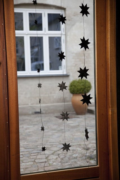 Black garland with 9 flat folded stars on a black string S
