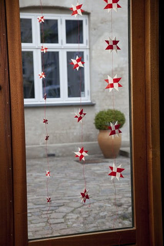 Mixed garland with 5 flat folded stars on a red string L